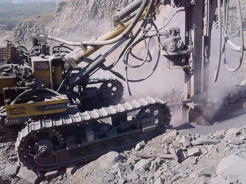 Atlas Copco Air Track drill rigs, alpine resort setting, 1986